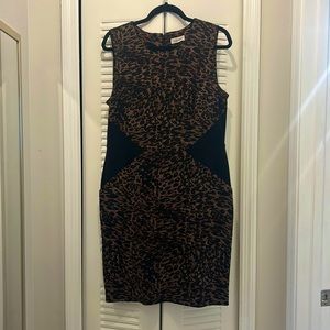 Turn heads in style with this stunning Calvin Klein cheetah print dress!